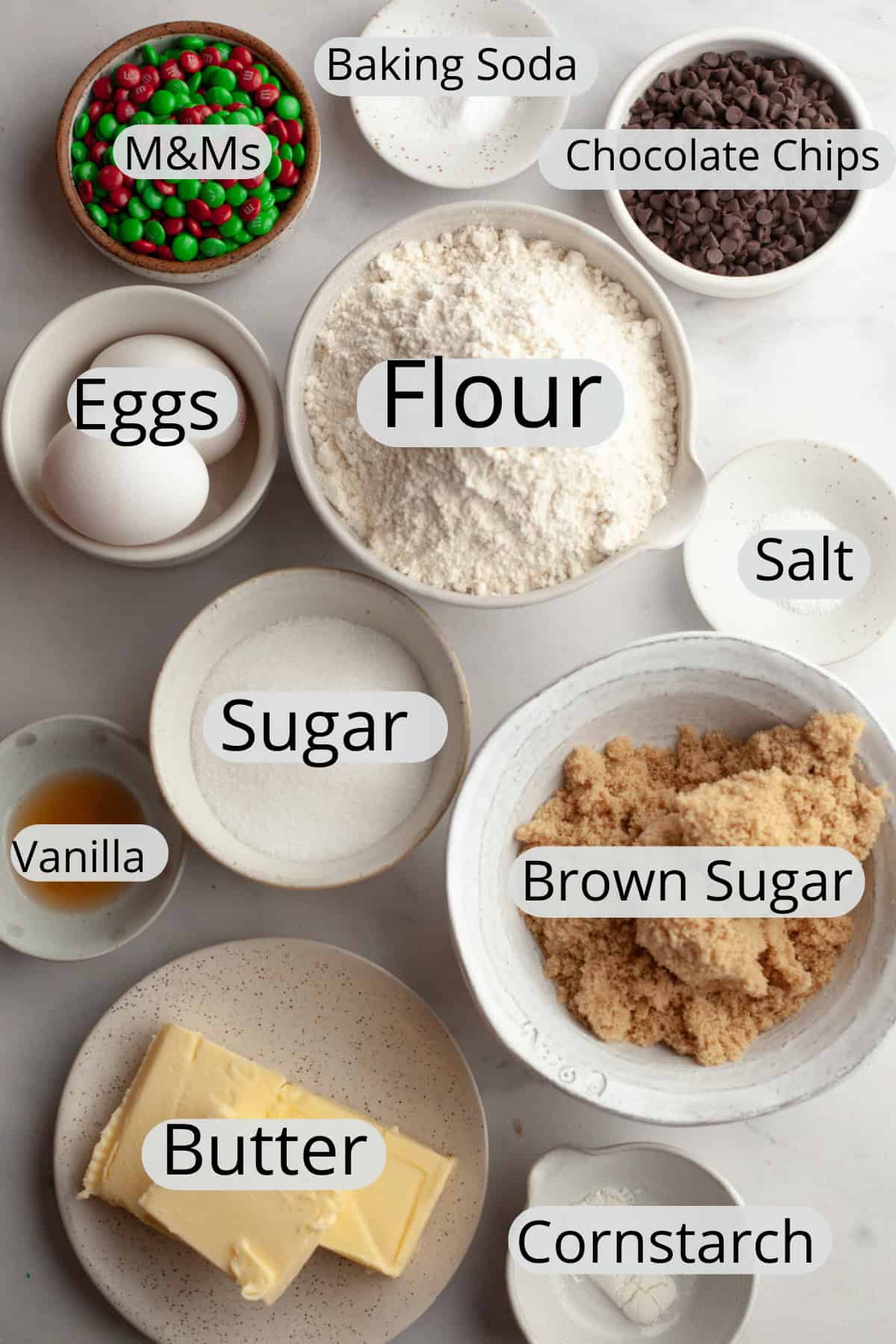 All the ingredients needed to make Christmas M&M chocolate chip cookies.