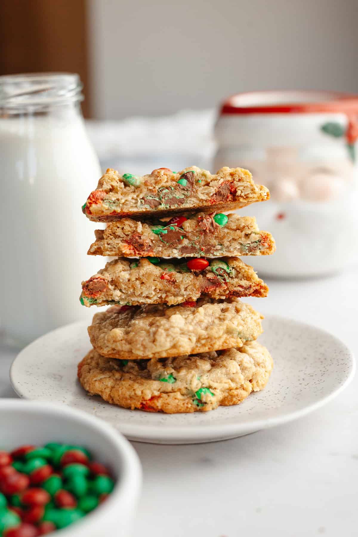 A small plate with a stack of oatmeal cookies.