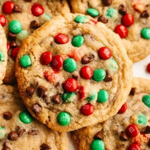 A close up of red and green Christmas chocolate chip cookies.
