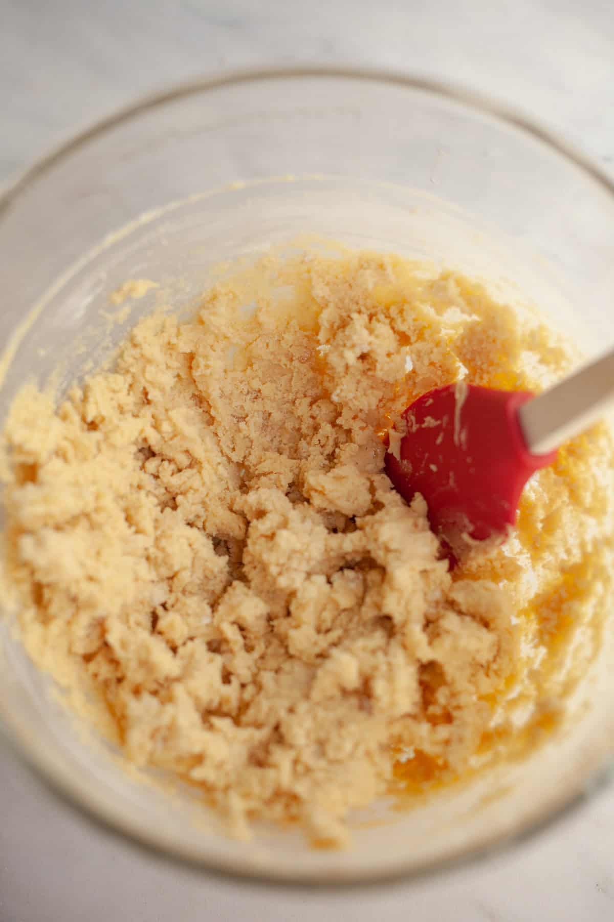 Cookie dough in a glass bowl.
