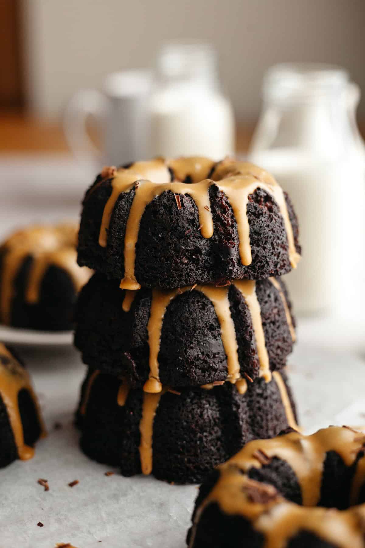 A stack of 3 mini chocolate bundt cakes.