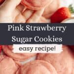A close up of pink strawberry sugar cookies on parchment paper, there are a few sliced strawberries.