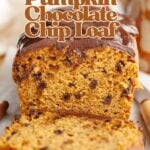 A sliced pumpkin chocolate chip loaf with a glossy chocolate glaze, displayed on a wooden board. Text overlay reads The very best Pumpkin Chocolate Chip Loaf.