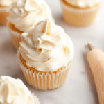 Vanilla cupcakes frosted with browned butter frosting.