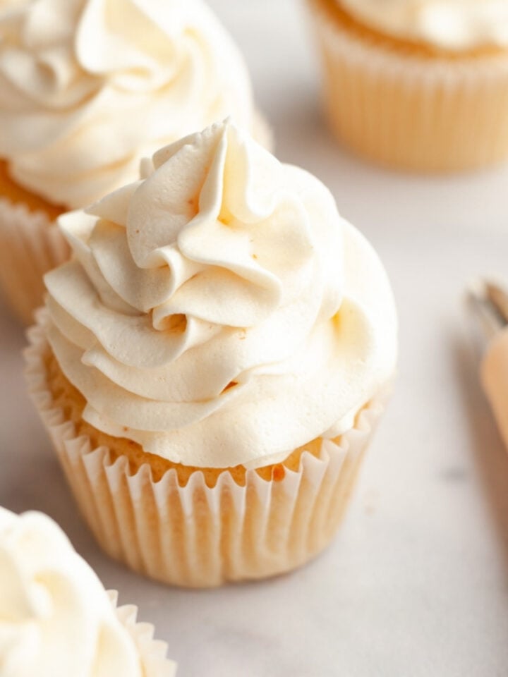 Vanilla cupcakes frosted with browned butter frosting.